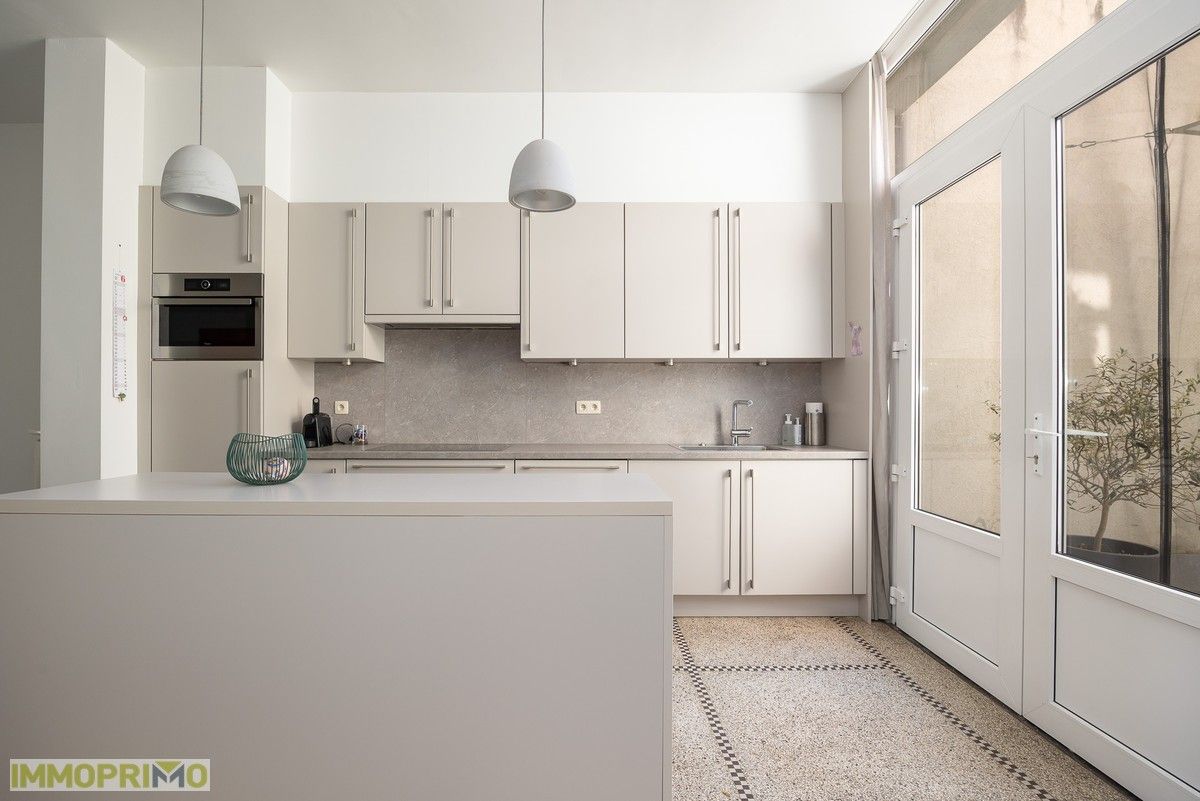 Ruim en stijlvol 1-slaapkamerappartement met zuidtuin en terras foto 3