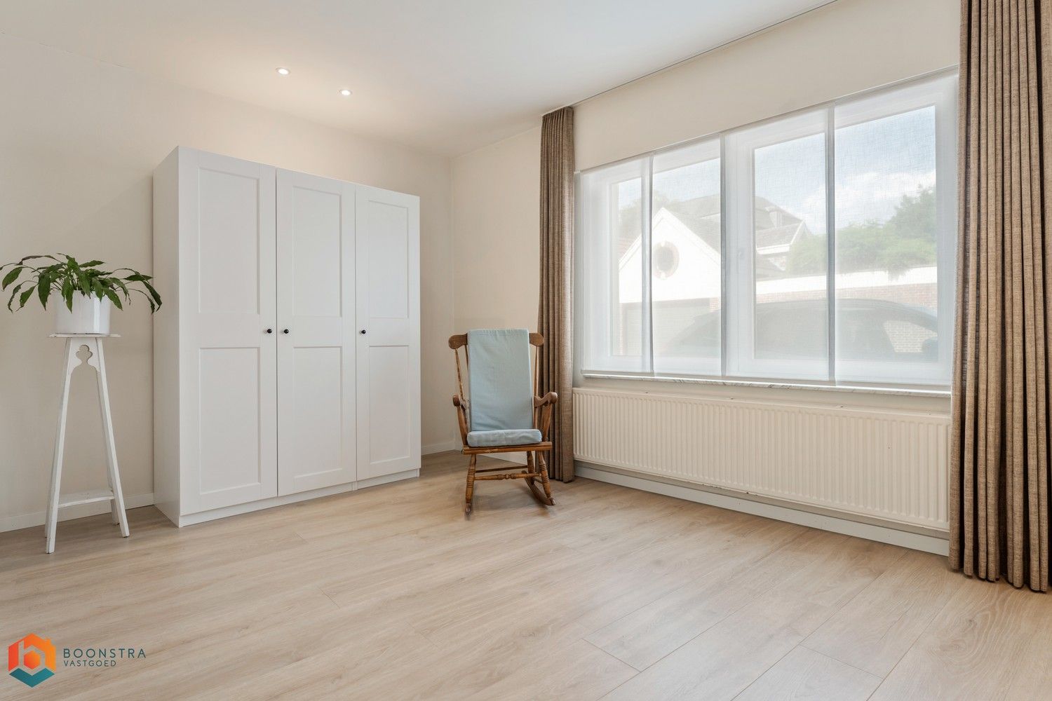 Instapklare rijwoning met 2 slpkrs in het centrum van Putte foto 2