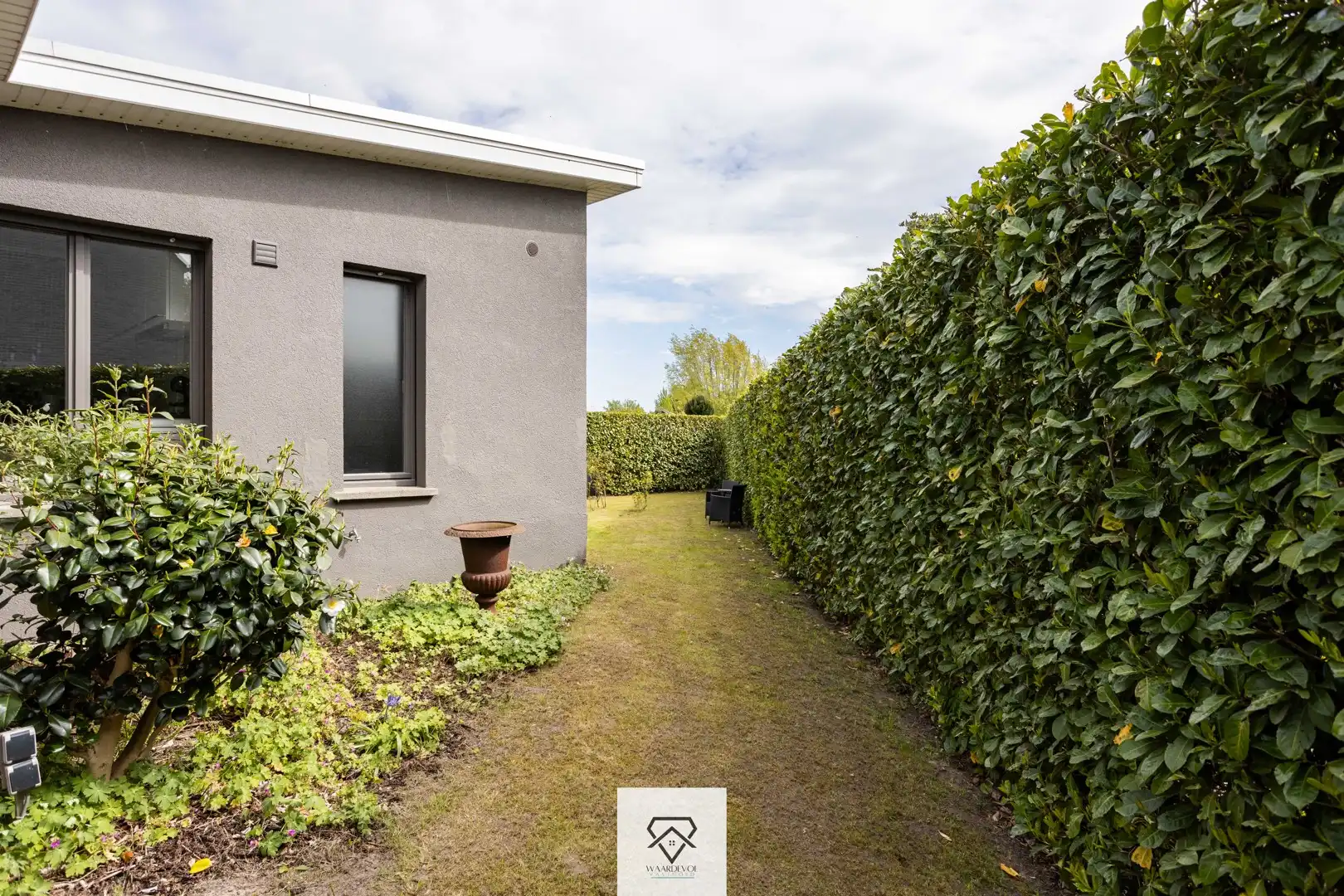 Gelijkvloerse woning met tuin en veel potentieel in Drongen foto 20