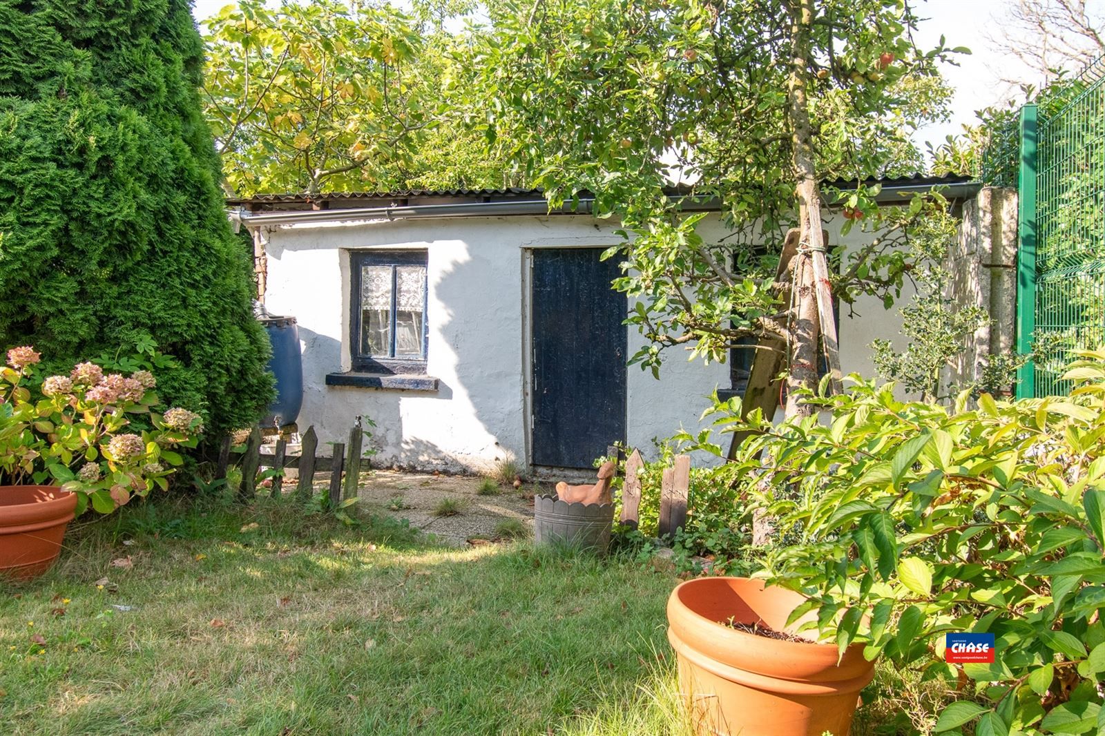 Rijwoning met 3 slaapkamers en gezellige tuin foto 12