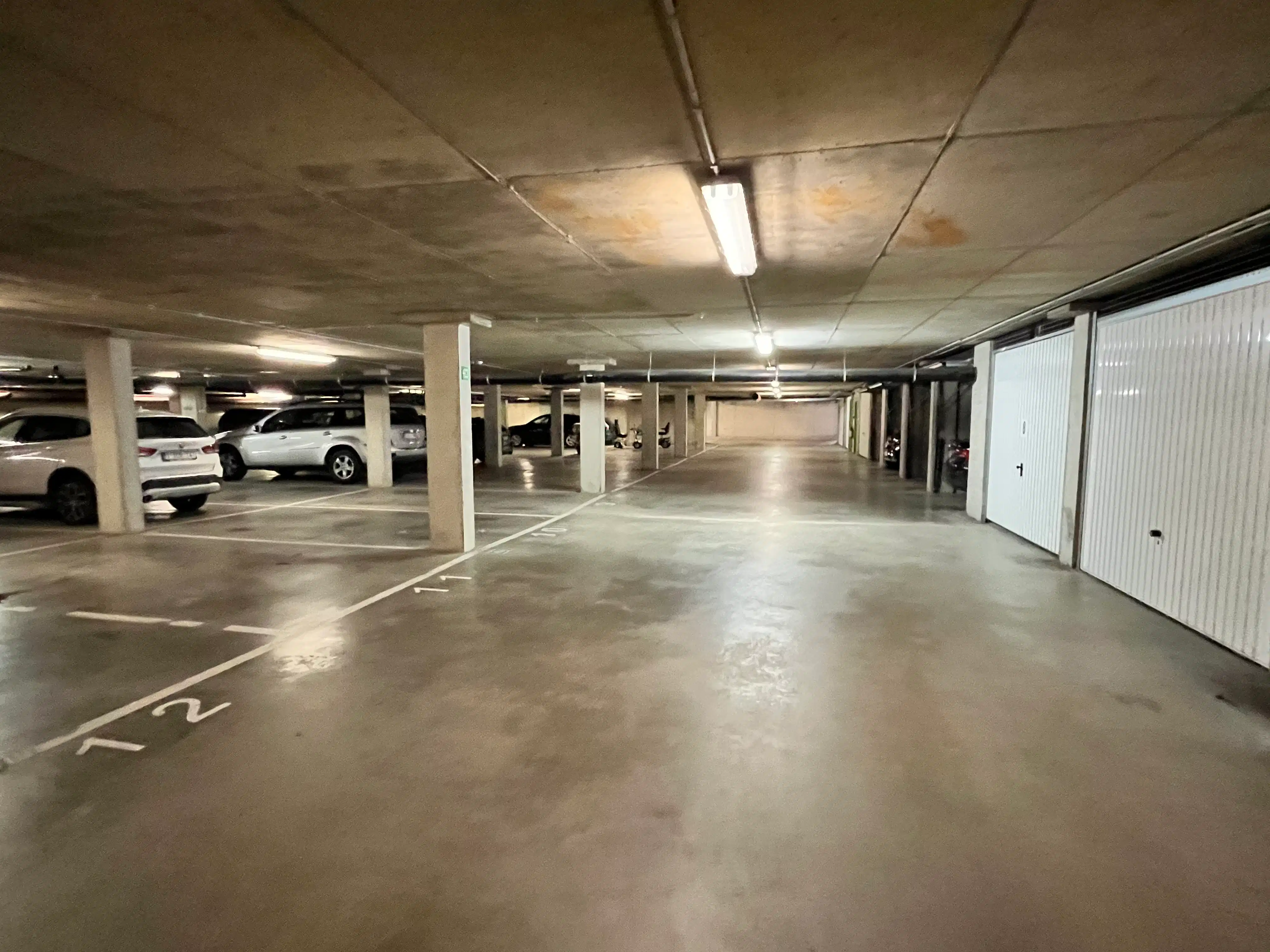 Ruime ondergrondse parkeerplaats te koop in hartje Leuven – Residentie Cartijenveld foto 7
