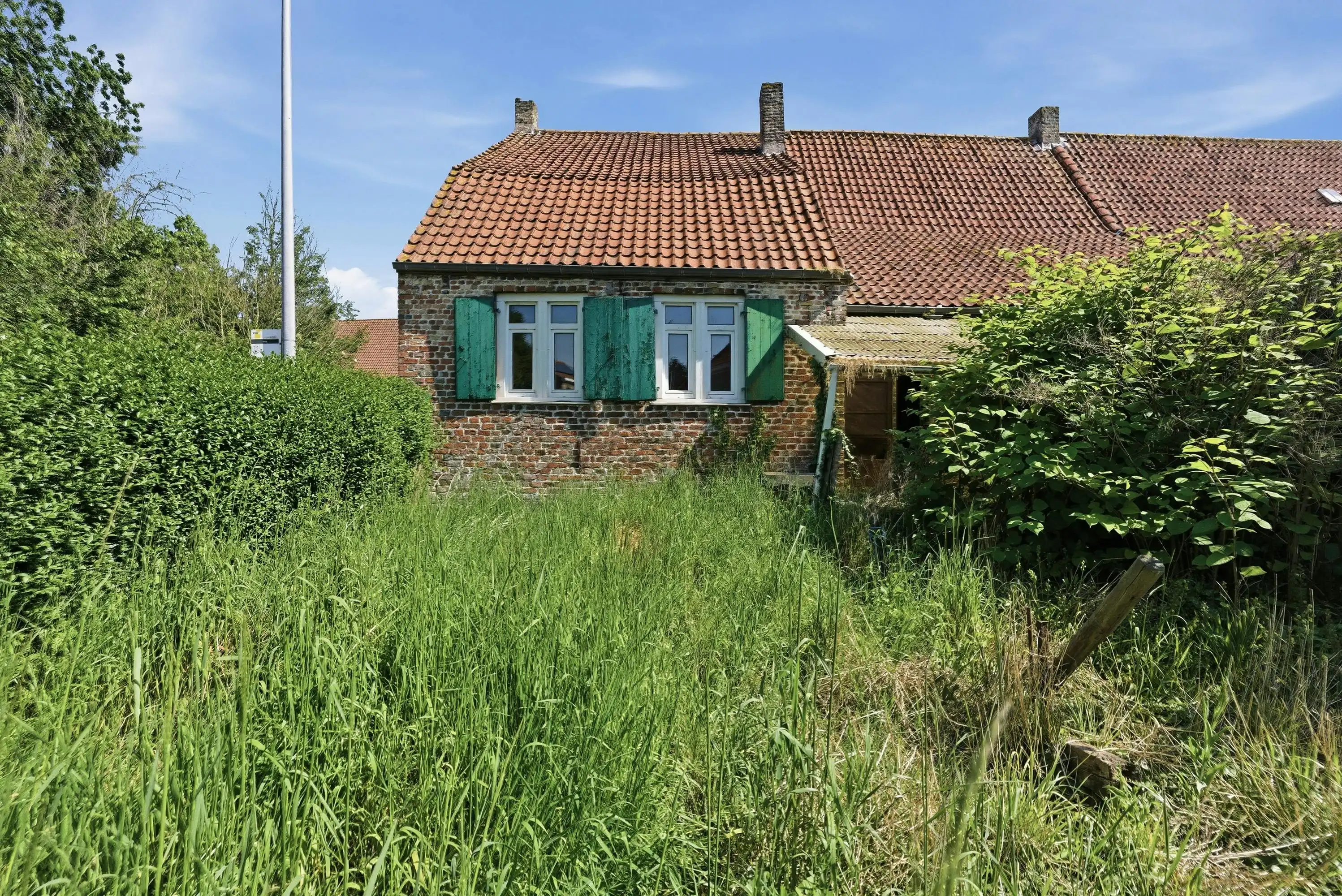 Karaktervolle renovatiewoning met veel potentieel in Beauvoorde. foto 13