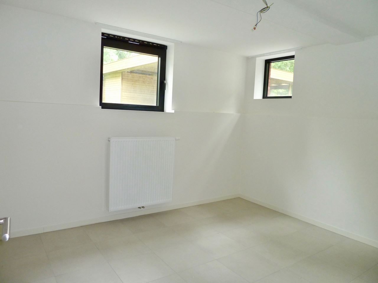 Genk, Busweg 3 bus 2 – Energiezuinig duplexappartement met 2 slaapkamers, ruim terras, autostaanplaats,... rustig gelegen op wandelafstand van het centrum. foto 11