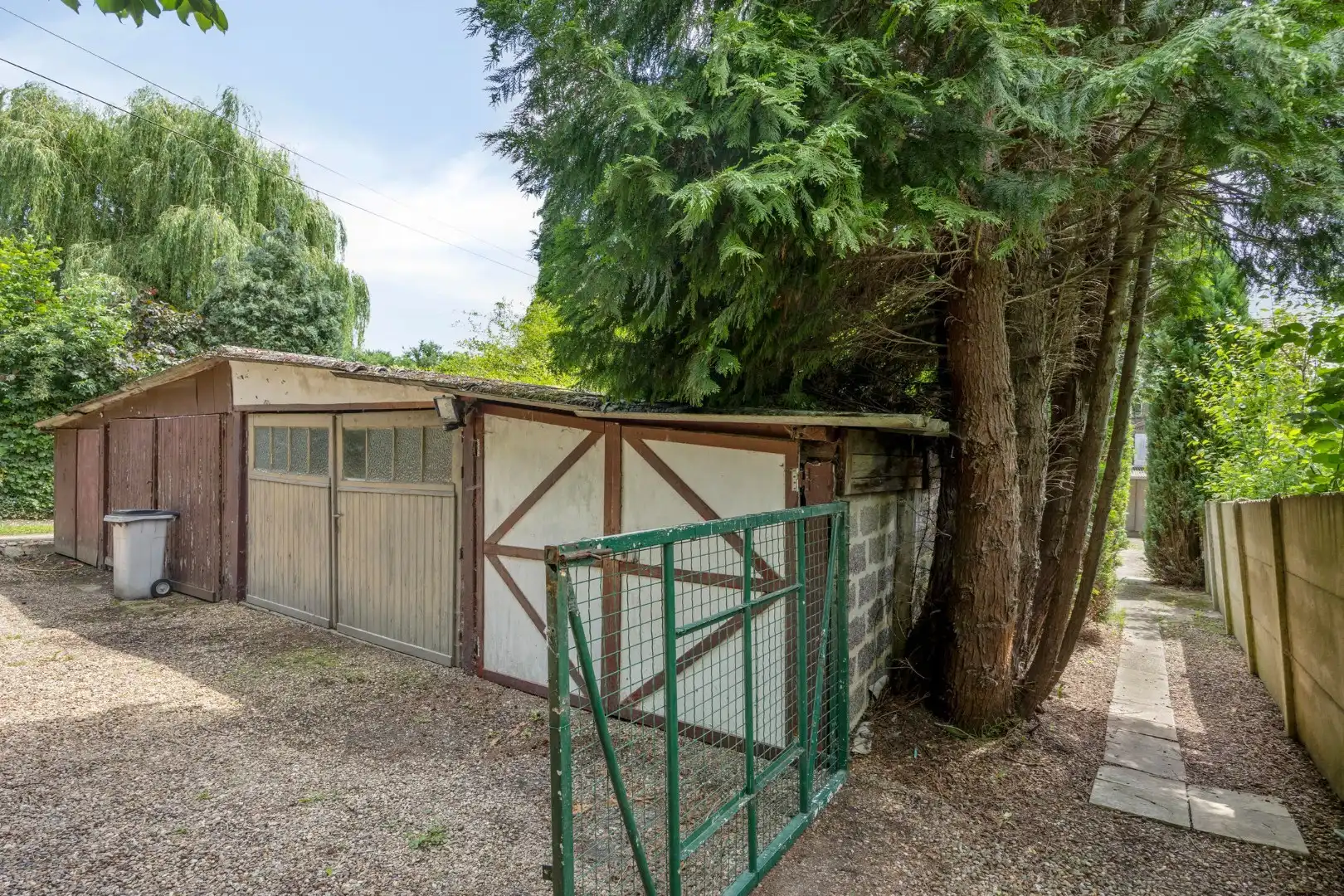 Ruime te renoveren woning met 3 slaapkamers in Lubbeek met doorgang langs het perceel van de buren. EPC: 736 KWH/m² foto 35