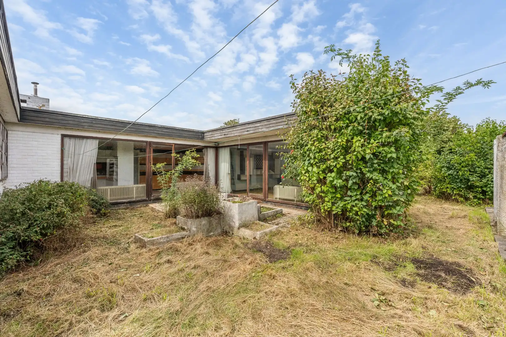 Karaktervolle patio-bungalow met renovatiepotentieel in doodlopende straat te Herent foto 21