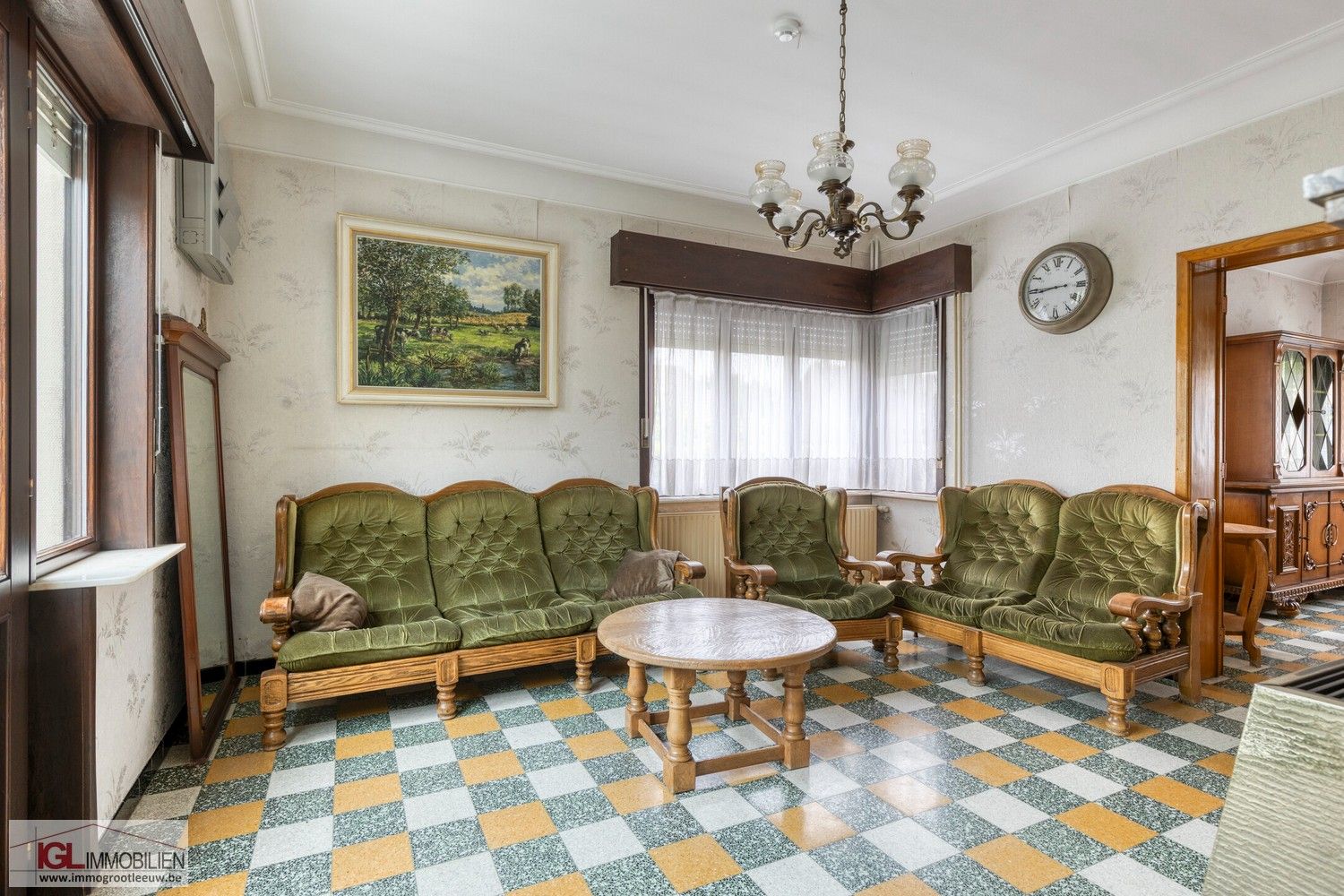 Rustig gelegen driegevelwoning met zonnige tuin & extra uitbreidingsmogelijkheden foto 2