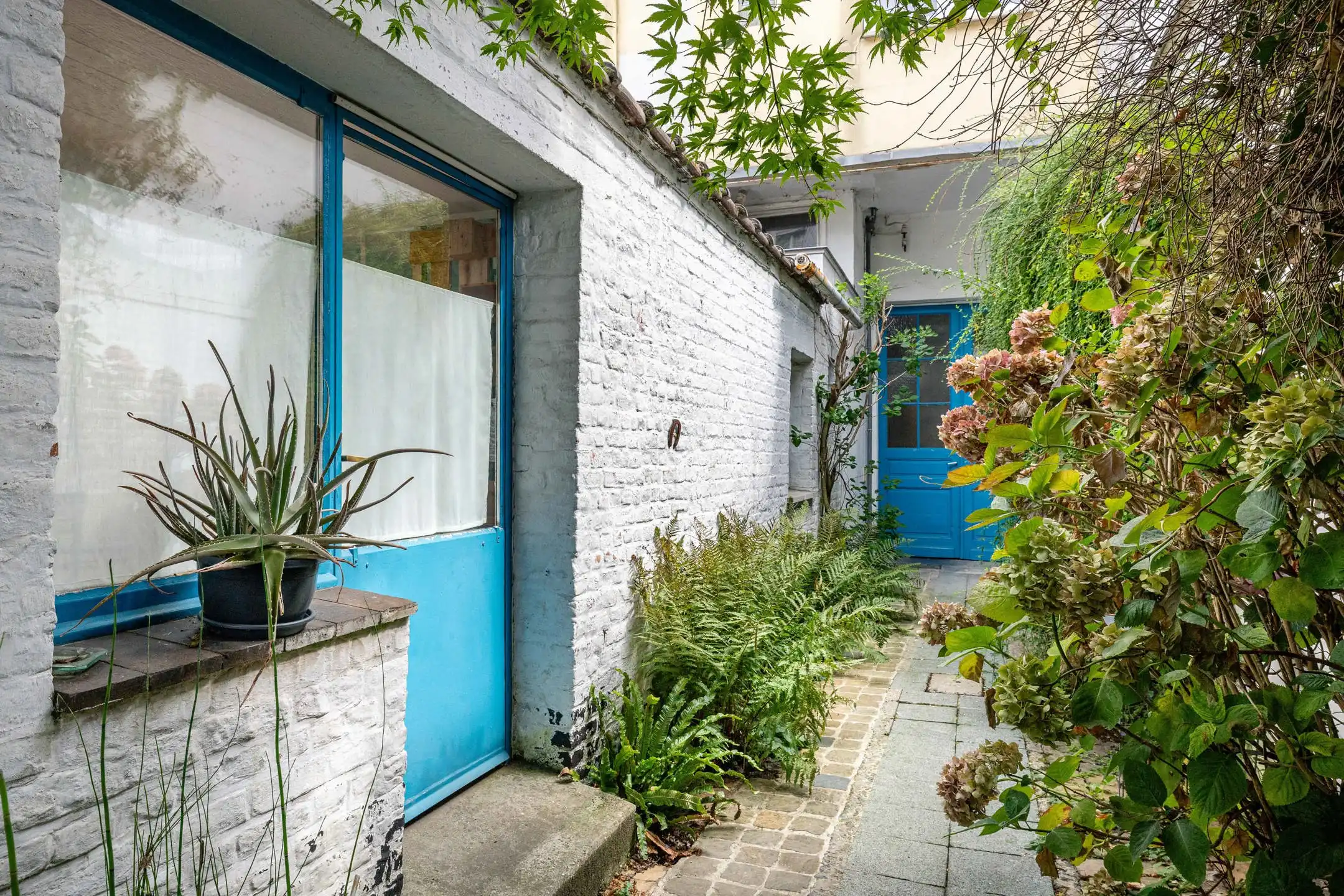 Begane grond 2 slaapkamers van ± 126 m² met tuin foto 10