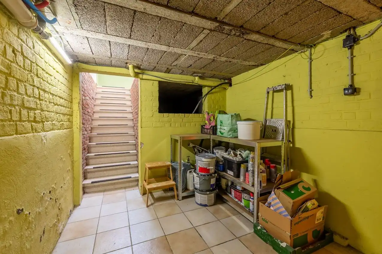 Ruime retrowoning met EPC C,  zuidtuin en achterliggende toegang. foto 47