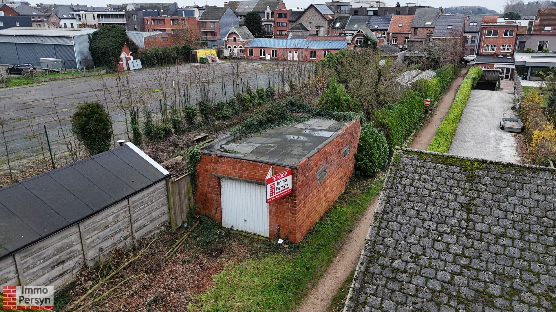 Gunstig gelegen garage met grond en potentieel voor stadstuin in de Rozenstraat foto 4
