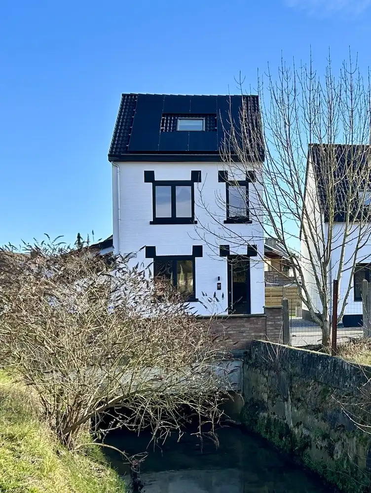 Volledig gerenoveerde woning met EPC-label A in het centrum van Bertem foto {{pictureIndex}}