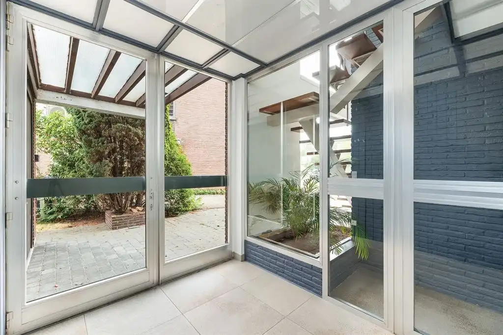 Unieke jaren 80-woning met ruime tuin foto 27