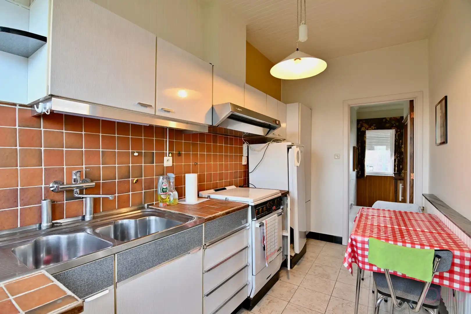 Ruime licht op te frissen woning nabij het centrum van Tienen met 3 slaapkamers op een perceel van 6a 40ca foto 10