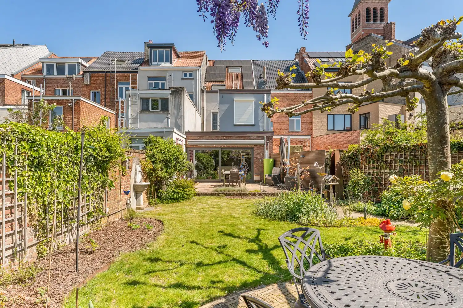 Gerenoveerde gezinswoning met 3 vergunde studentenkamers en een tuin te centrum Leuven! foto 6