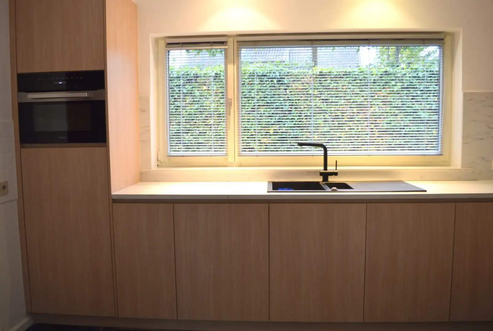 Charmante halfopen bebouwing met 2 ruime slaapkamers en zuid georiënteerde tuin foto 5