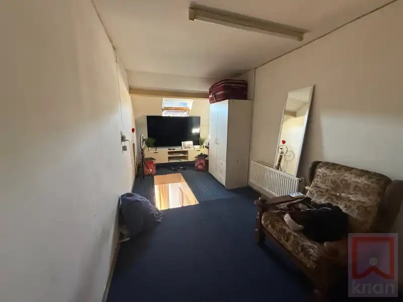 Gebouw met 11 kamerwoningen, centrum Geel op 8a66. foto 13