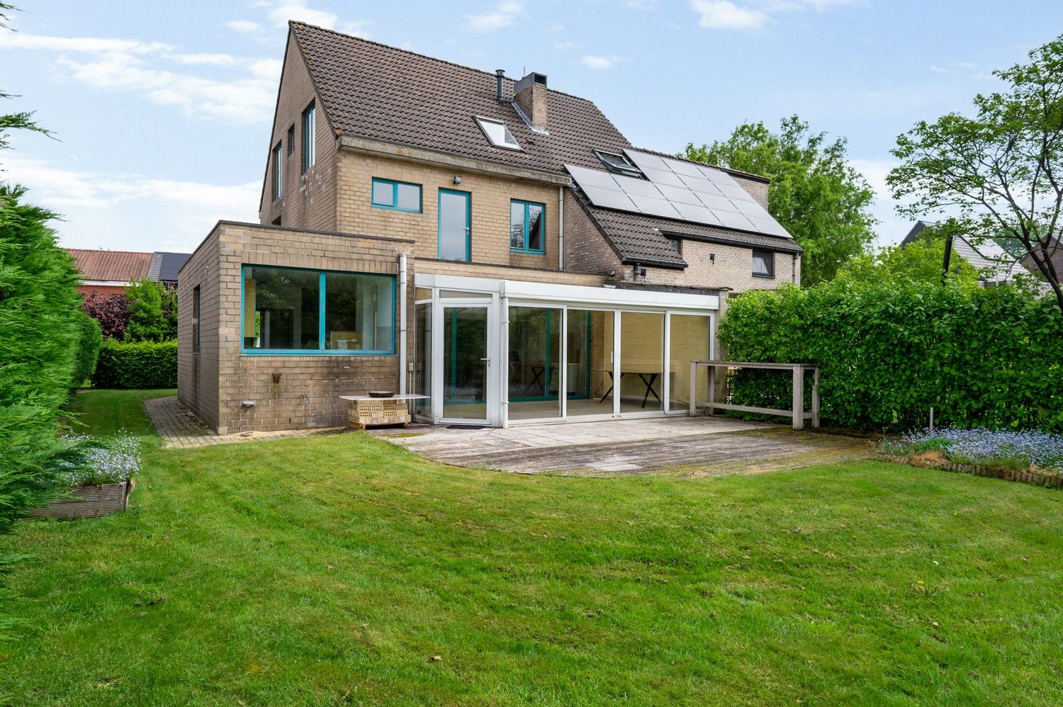 Ruime halfopen bebouwing met zuidwest georiënteerde tuin te Lint foto 22