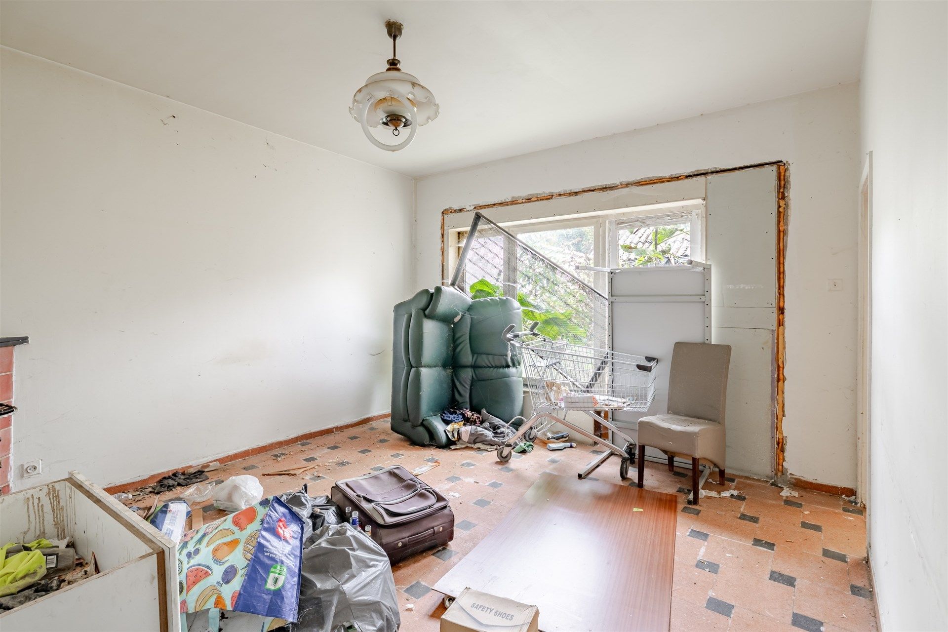 Renovatieproject bestaande uit 3 appartementen + 1 huis + 8 garageboxen foto 11
