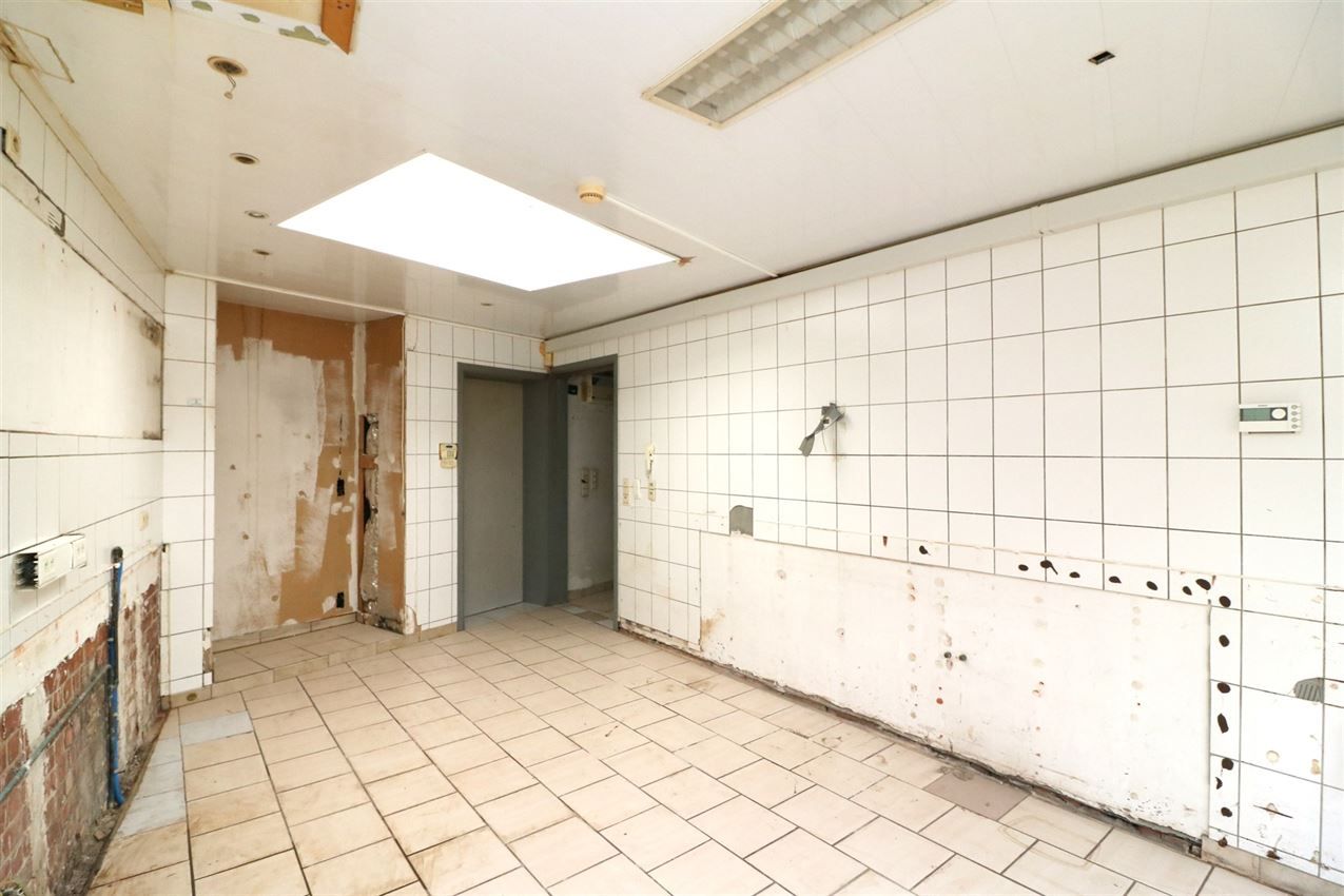 handelszaak met veel mogelijkheden in centrum foto 15