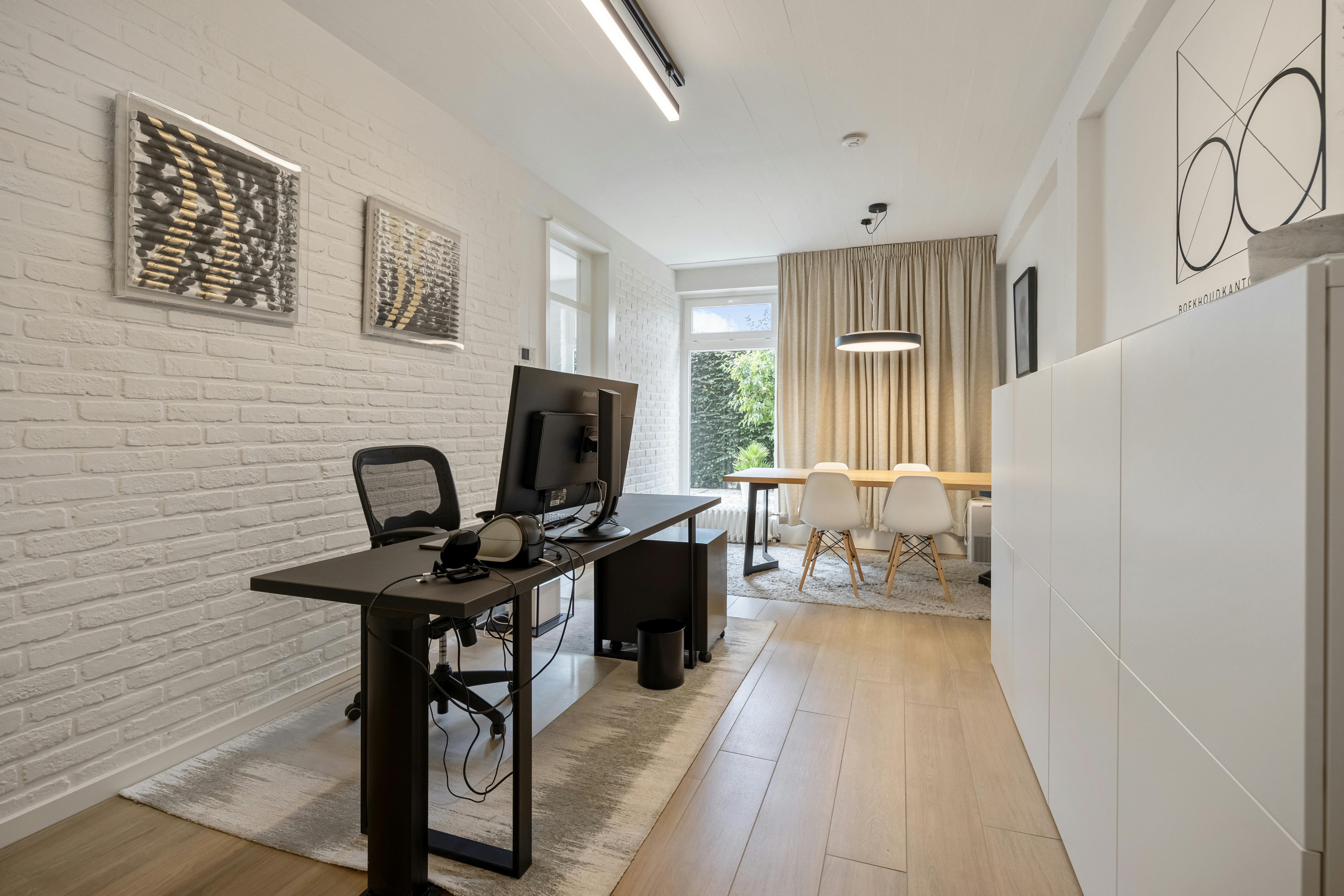 Uitzonderlijke villa met praktijk op toplocatie in Hasselt foto 12