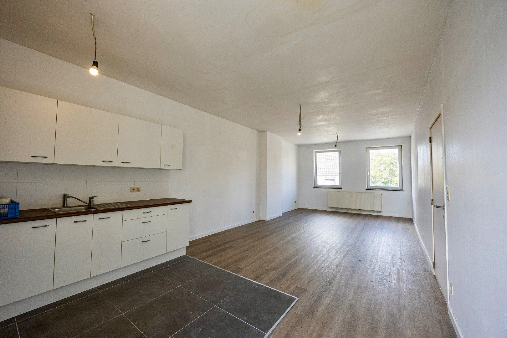 Veelzijdige opbrengsteigendom met café, appartement en topligging in Dworp foto 18