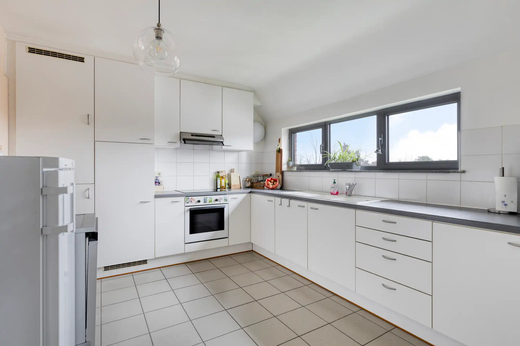 Ruim appartement(143m2) met 3 slaapkamers in hartje Wezemaal foto 7