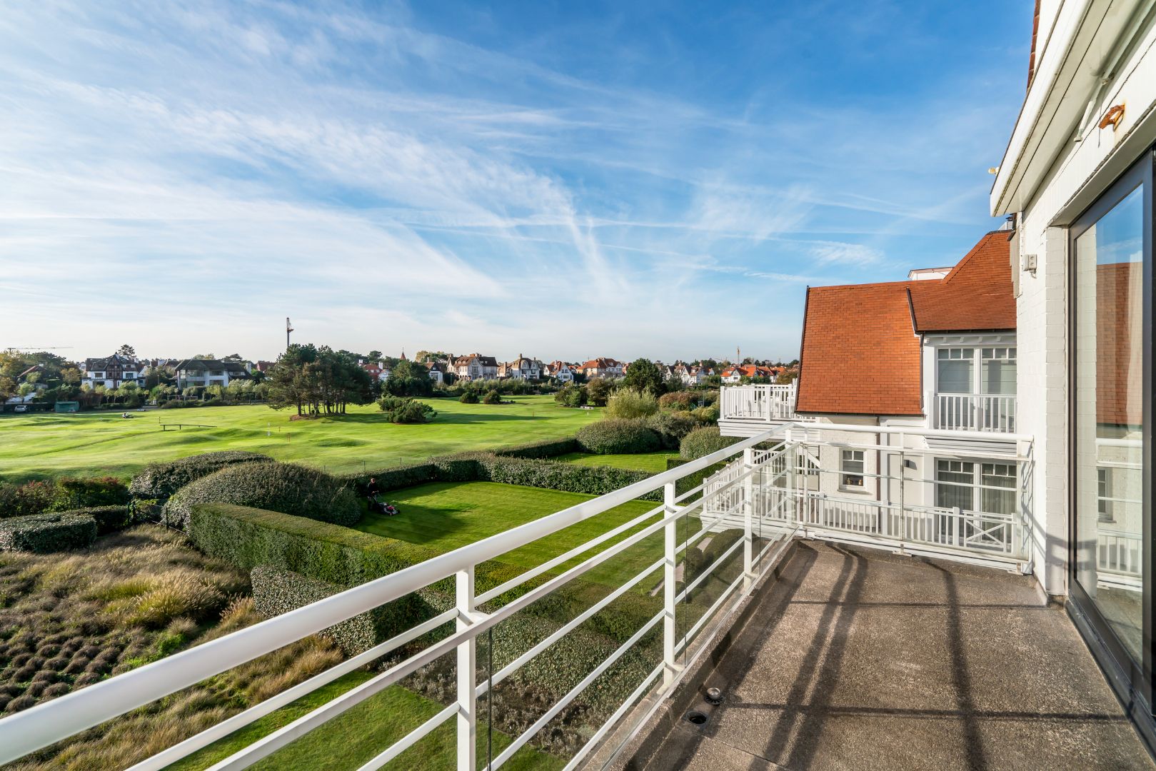 Perfect georiënteerd hoekappartement met zichten over de Approach golf foto 1