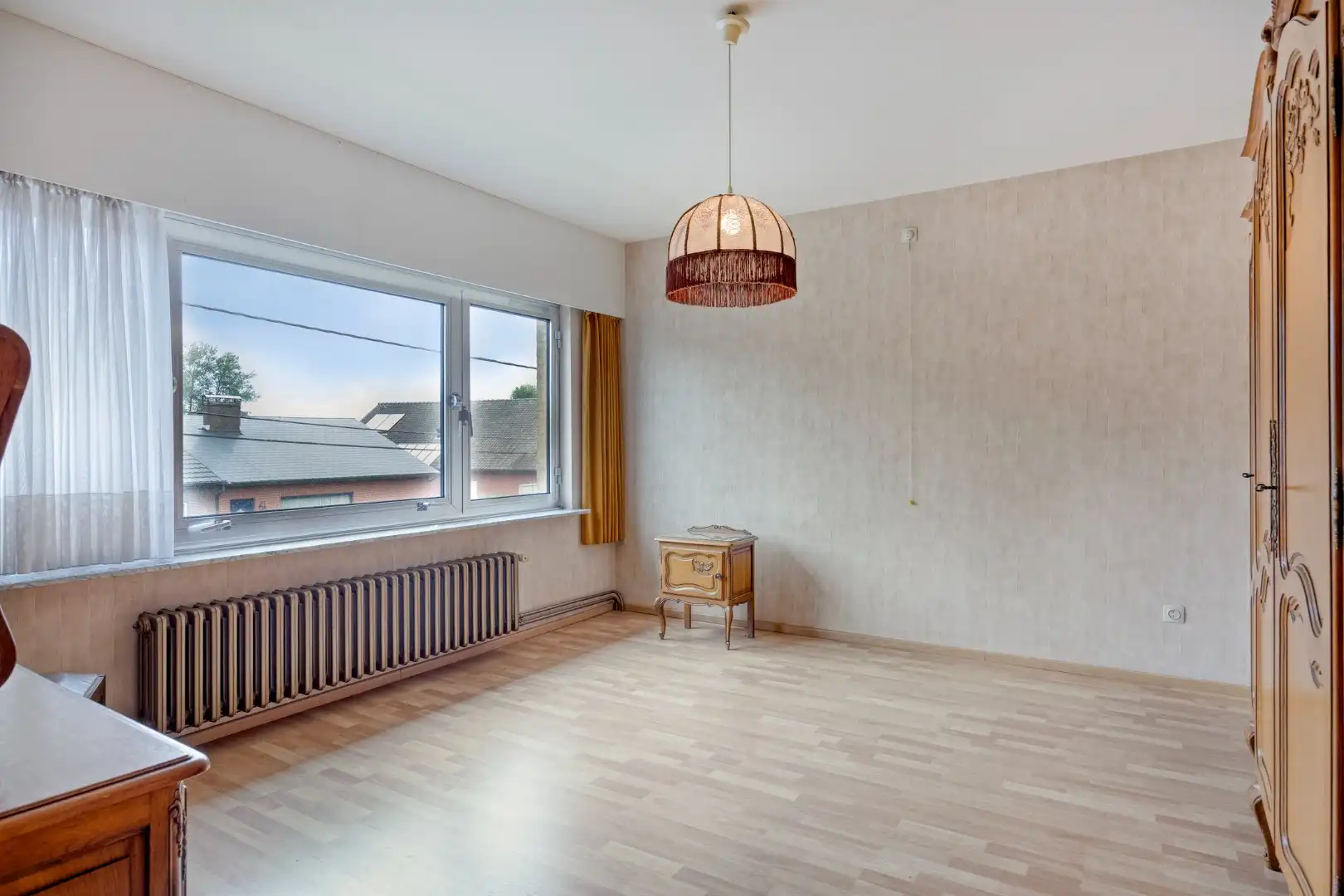 Ruim ingedeelde woning met ioa 4 slpks op een rustige en centrale ligging. foto 14
