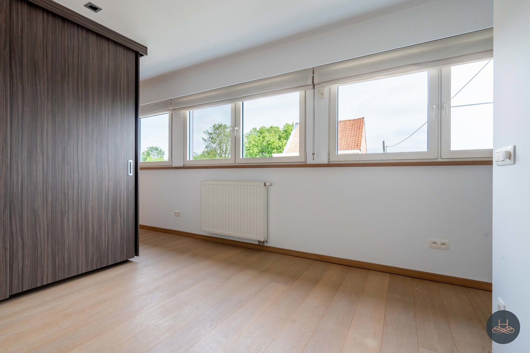Ruim appartement met grote garage foto 12