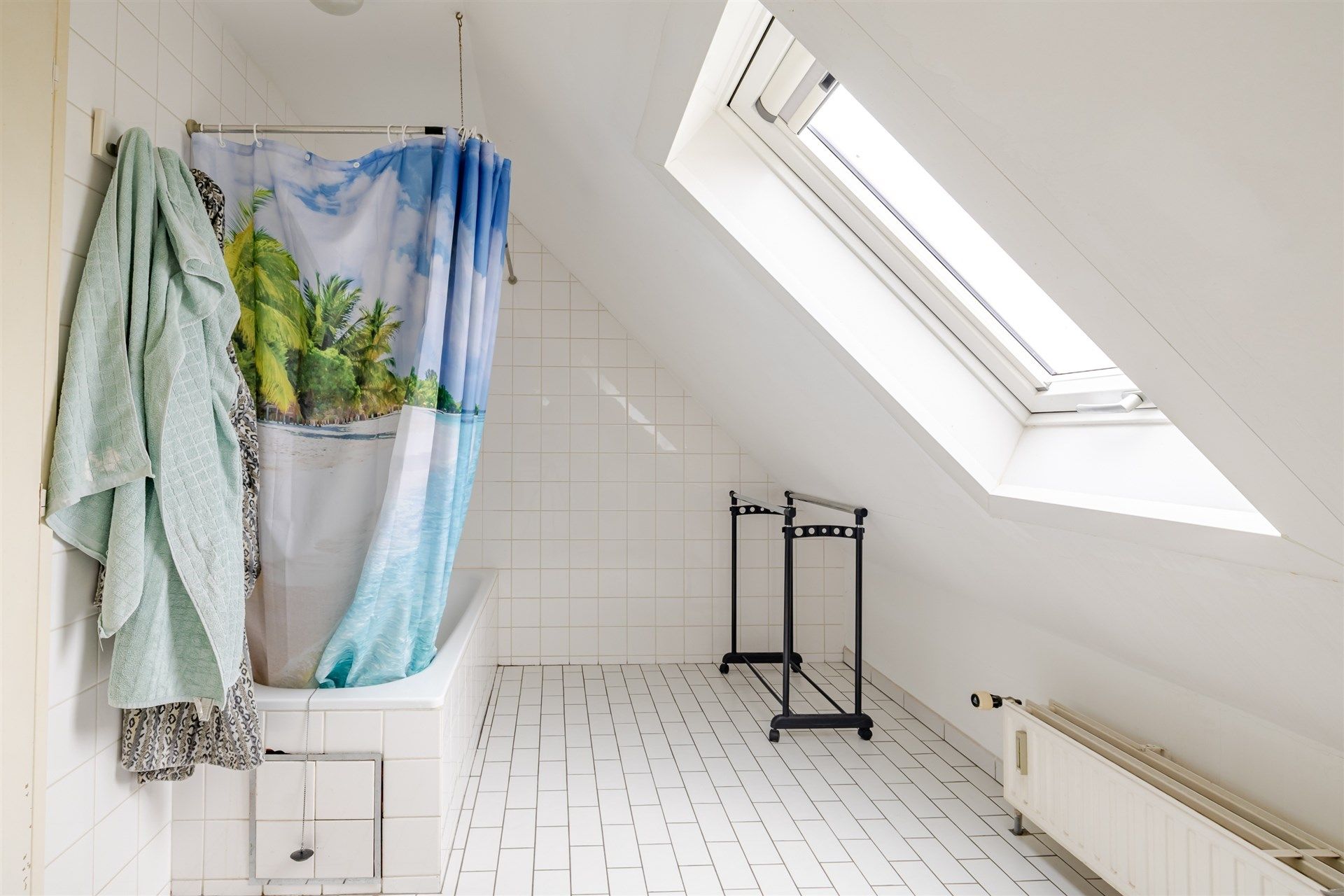 Opbrengsteigendom bestaande uit 4 appartementen + 22 garageboxen + magazijn/werkplaats foto 13