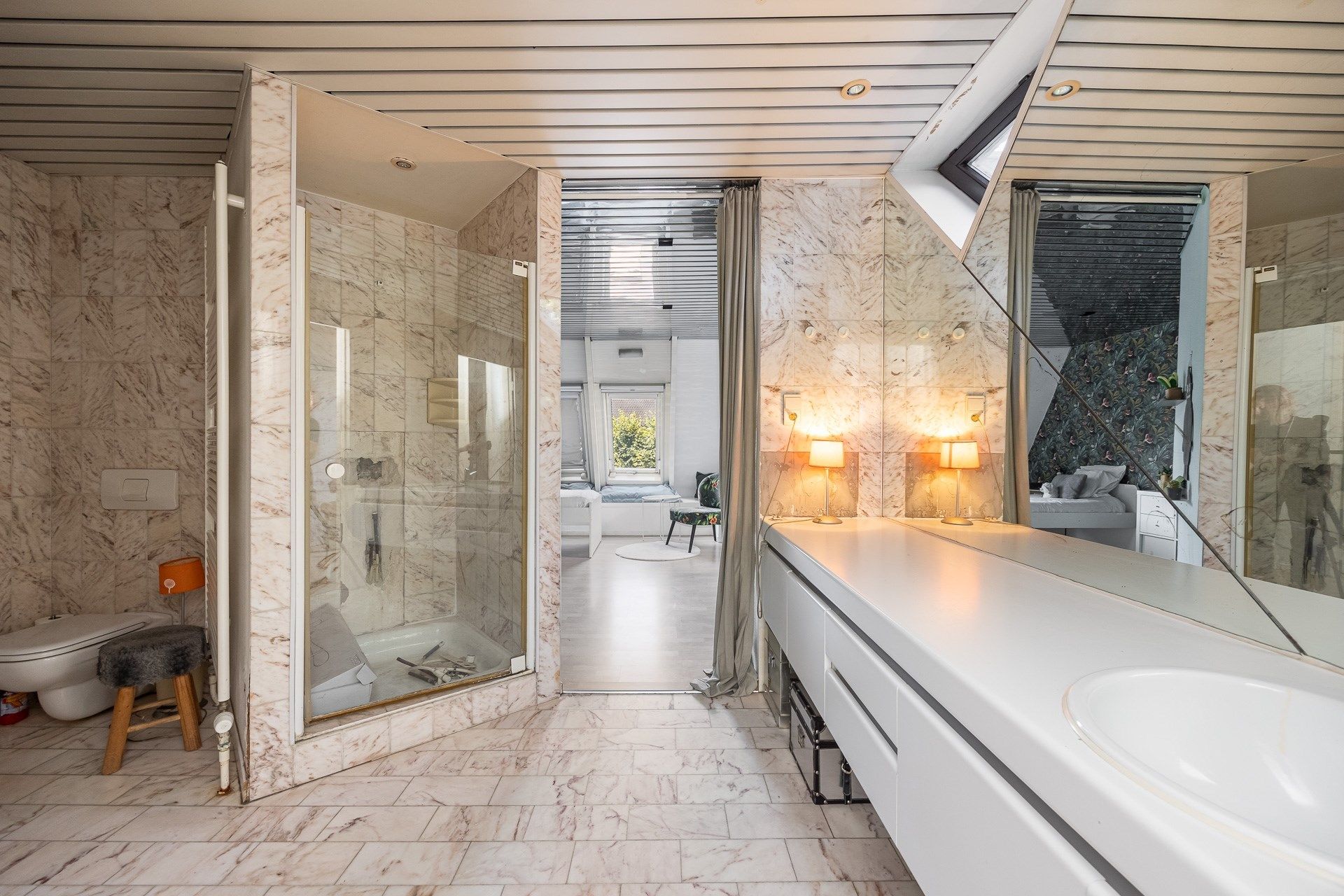 Unieke architectenwoning met tuin en polyvalente ruimte foto 15