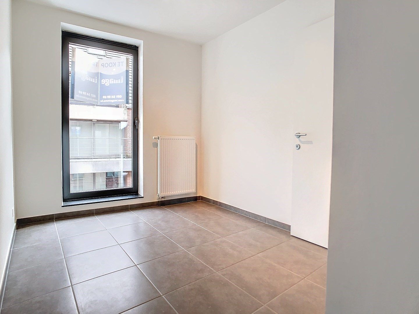 Energiezuinig, modern appartement met 2 slaapkamers in centrum Oostnieuwkerke foto 7
