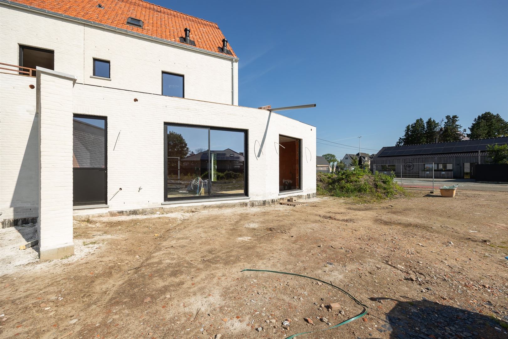 Woning met 4 slaapkamers en apart bureau met Zuid tuin.  foto 10