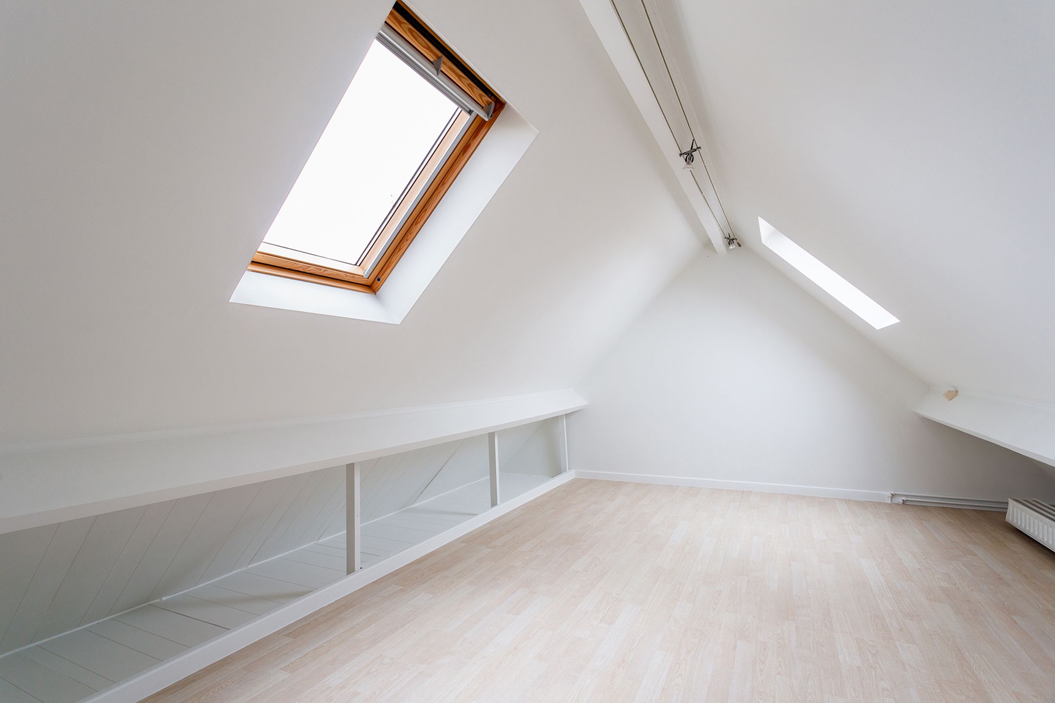 Opbrengsteigendom met 2 appartementen en 2 garageboxen foto 27