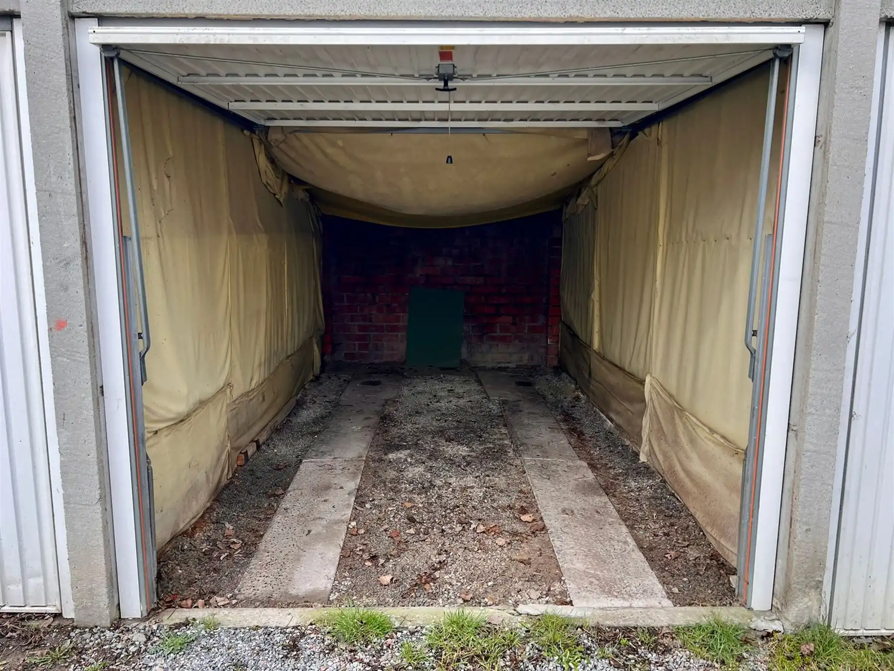 Ideale investering bouwgrond met 20 achterliggende garageboxen foto 5