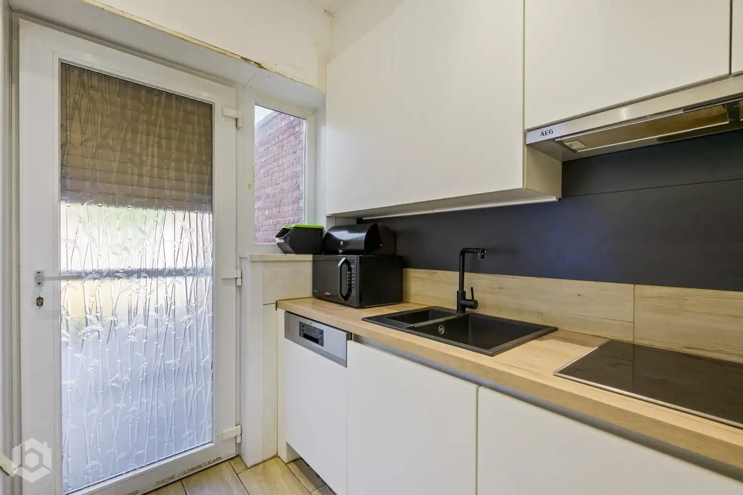 Instapklare woning met 4 slpkrs en ruime tuin te Niel foto 10