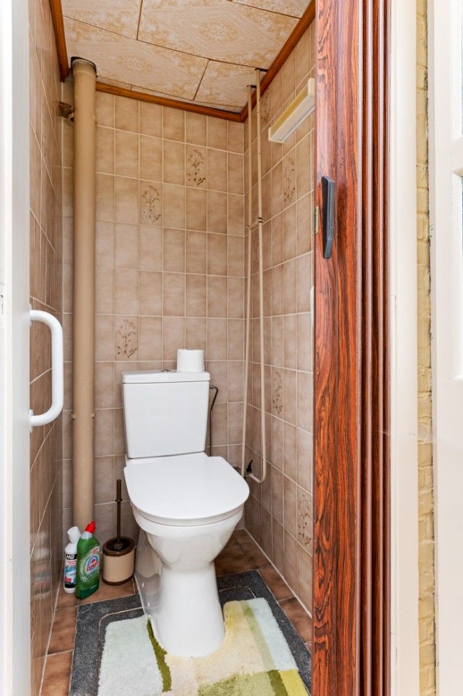 Te renoveren woning met 2 slpk. en tuin foto 13