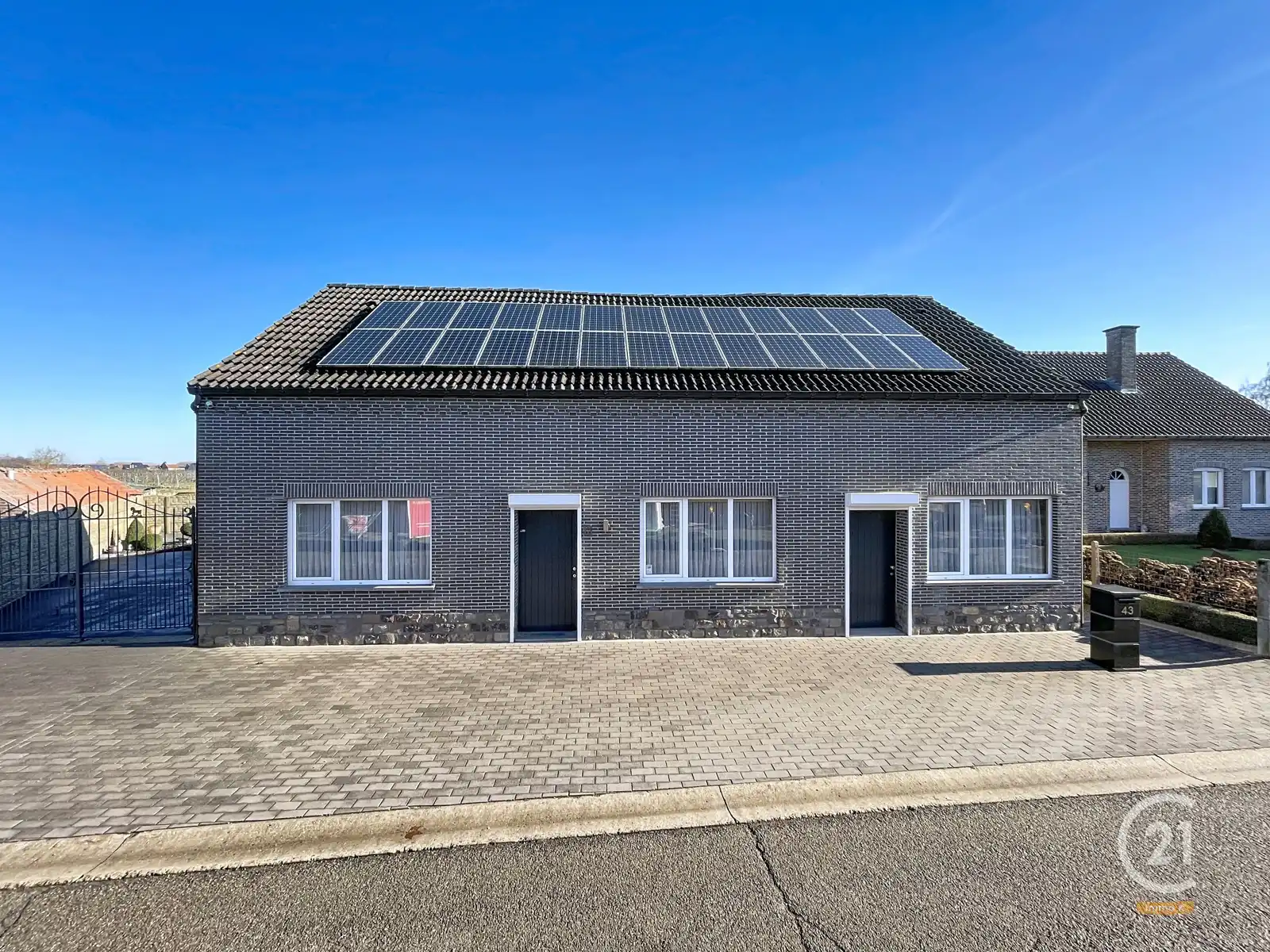 Hoofdfoto van de publicatie: Degelijke, veelzijdige woning met ruime tuin van 12a35ca.