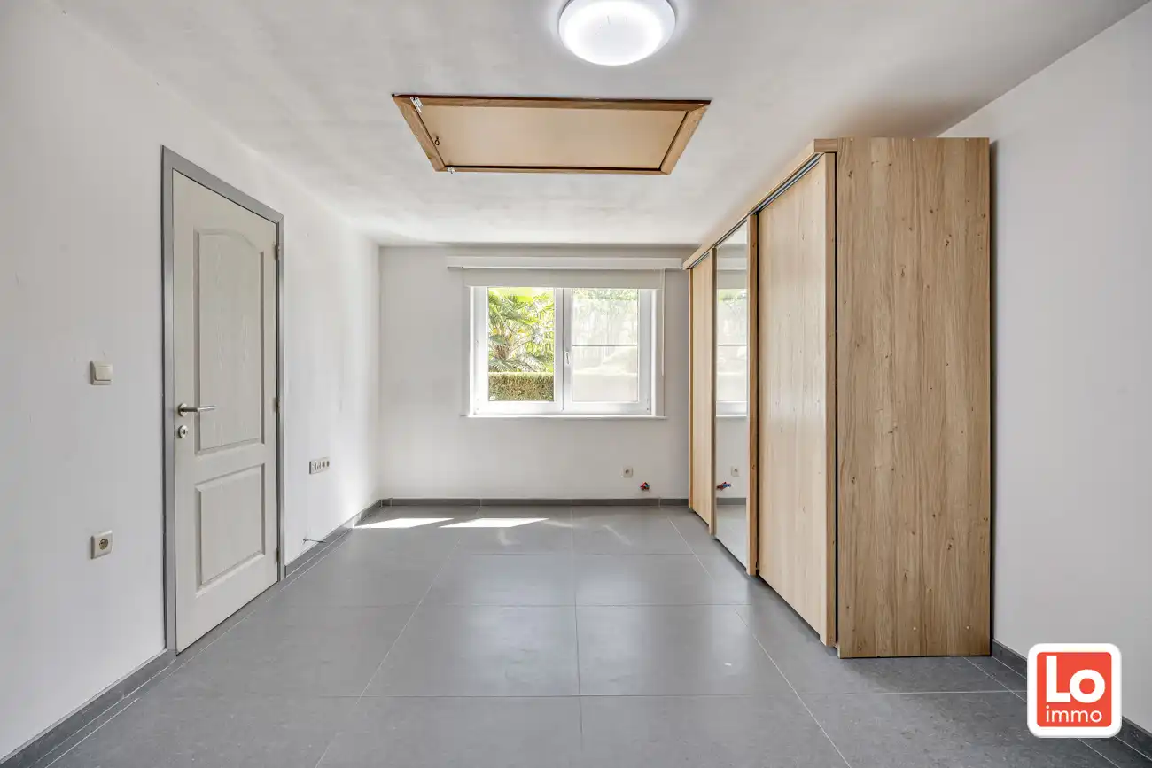 Landelijk gelegen half open woning met ruim bijgebouw (ca. 65m) en grote tuin met open zicht tussen Hijfte en Lochristi. foto 19