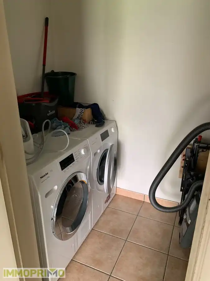 Ruime woning met 4 slaapkamers en garagebox in een woonerf te Mortsel foto 8