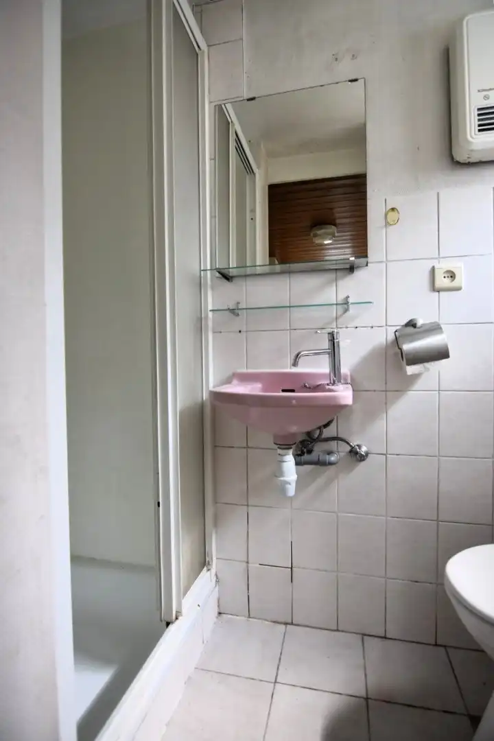 Te renoveren rijwoning met goeie ligging foto 10