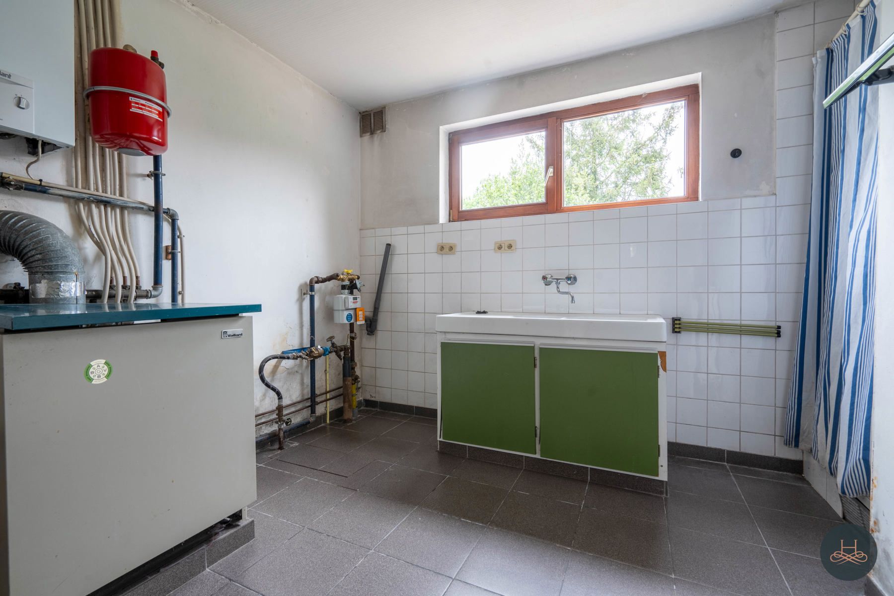 Achterliggende gezinswoning op rustgevend perceel foto 11