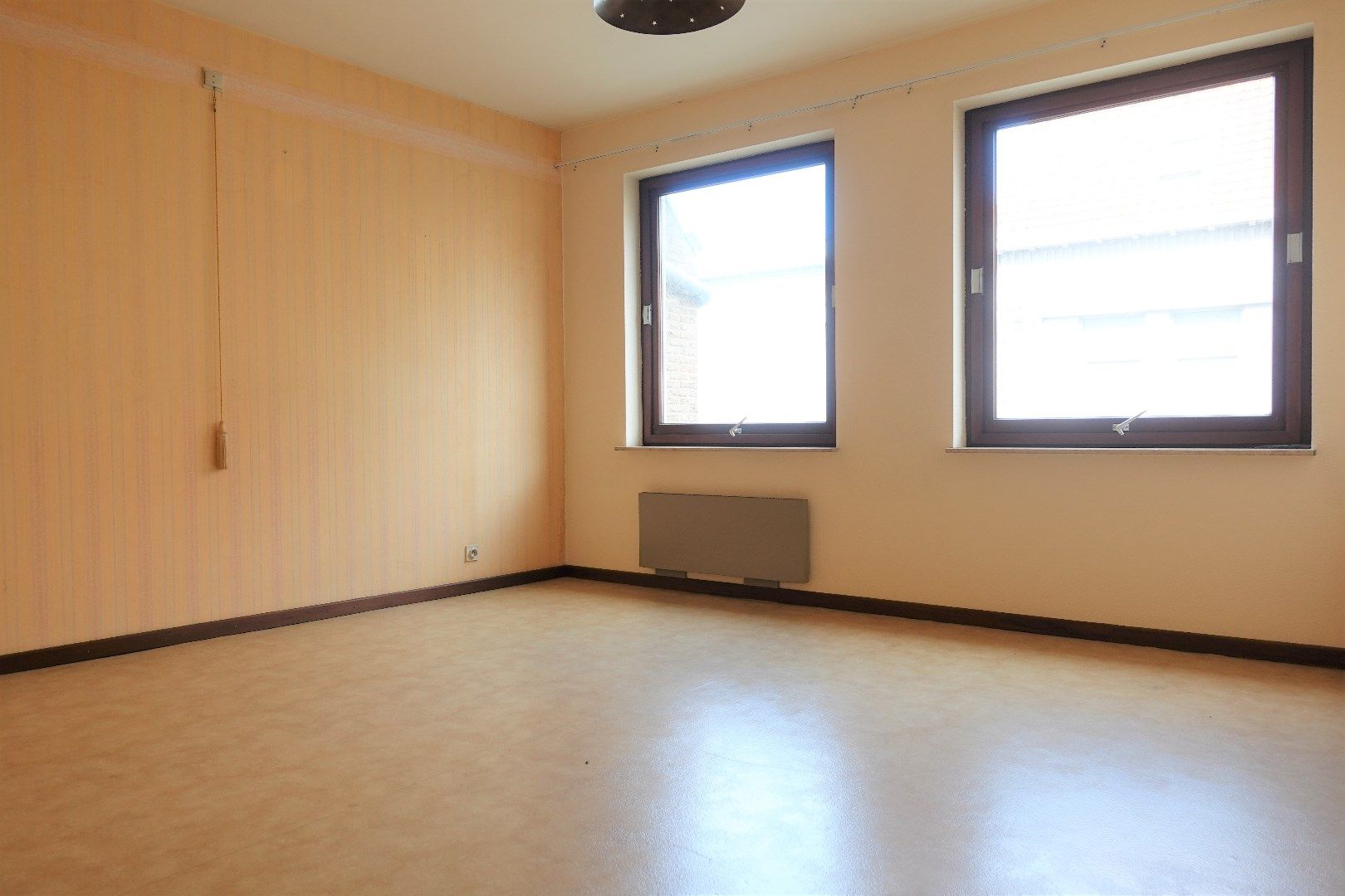 Opbrengsteigendom met 7 appartementen, 2 handelspanden en 7 garageboxen in Gistel foto 12
