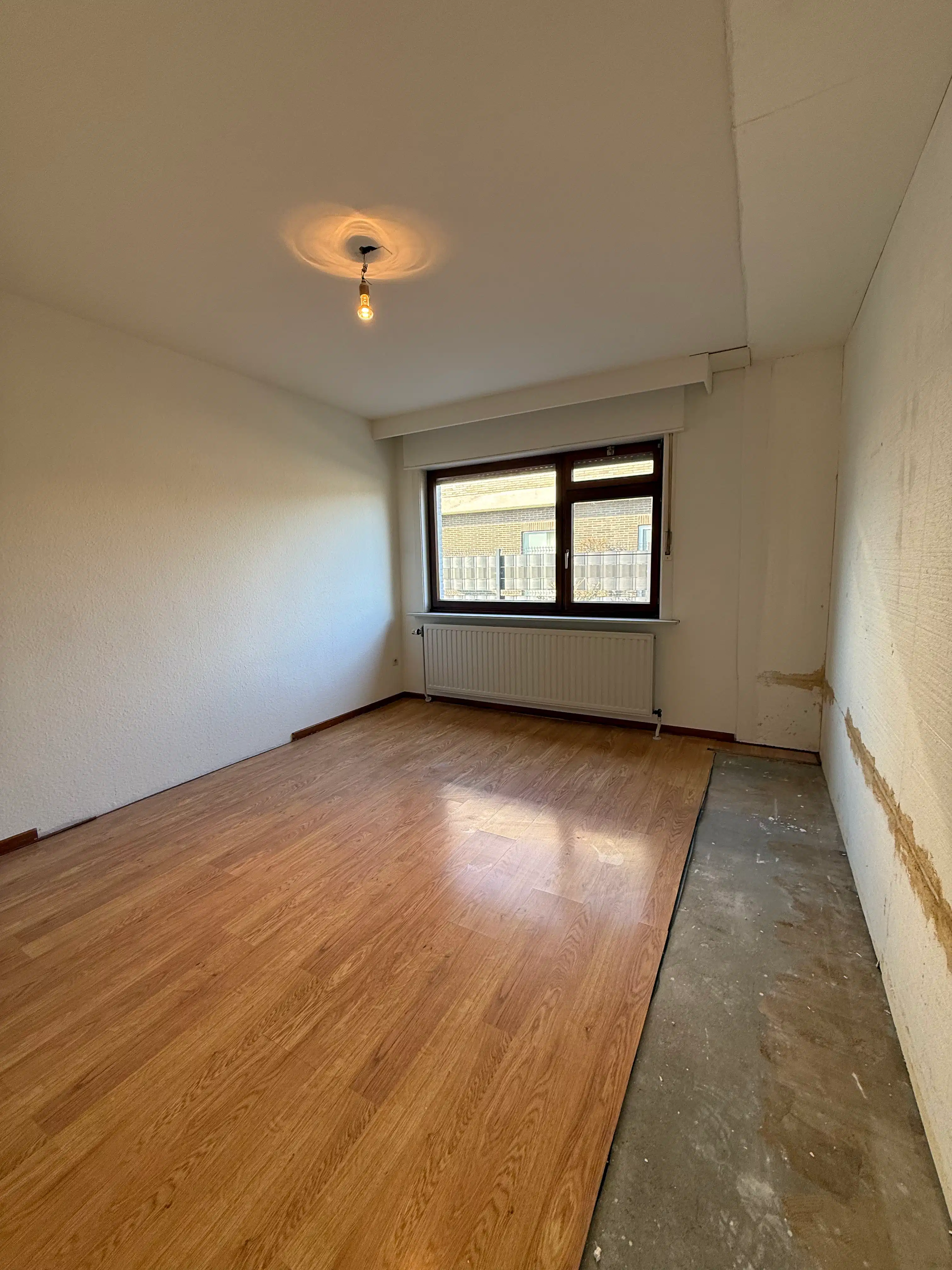 Gelijkvloerse halfopen woning met praktische tuin in Lanaken foto 11