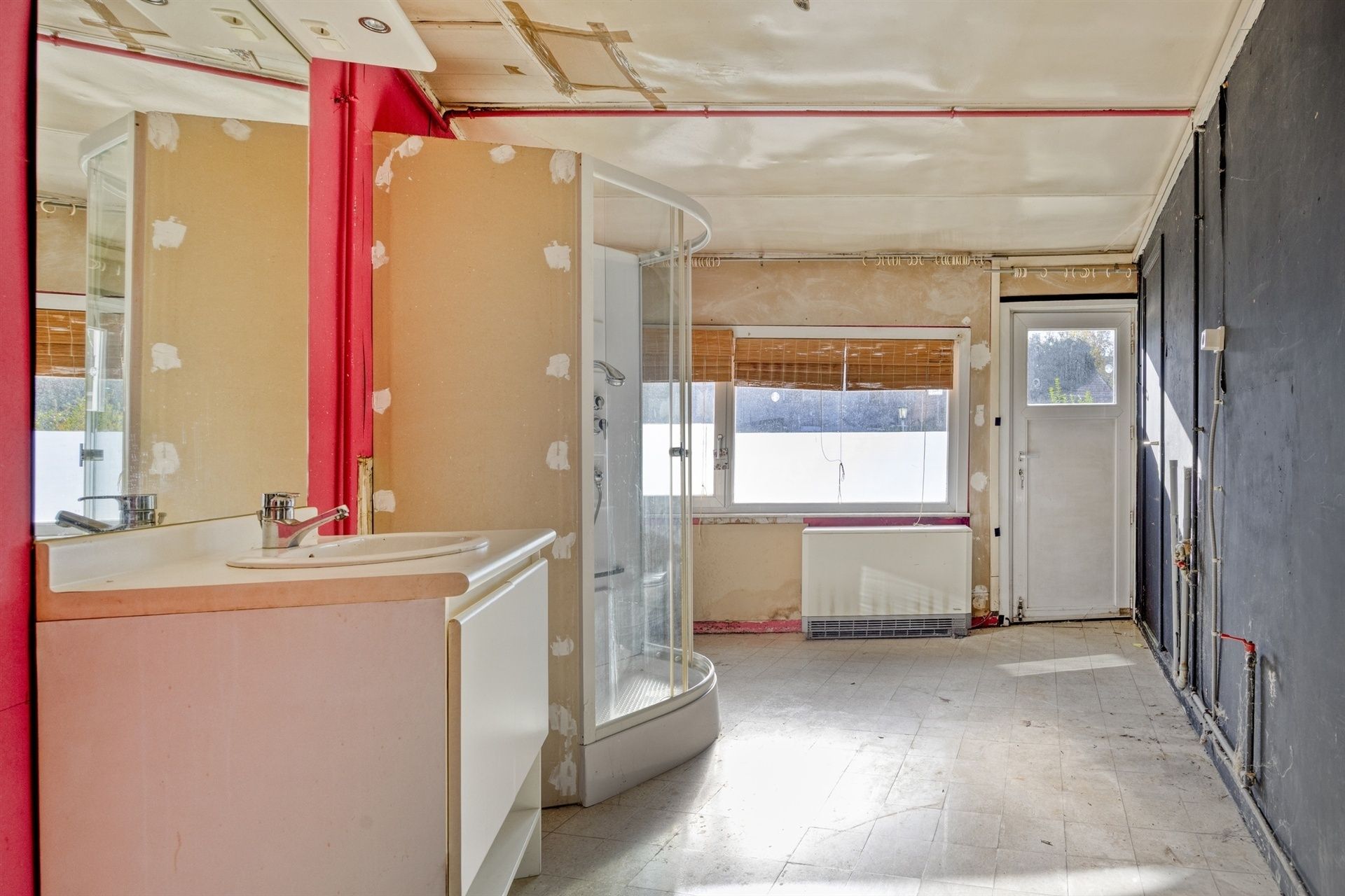 Te renoveren woning in centrum Mollem foto 10