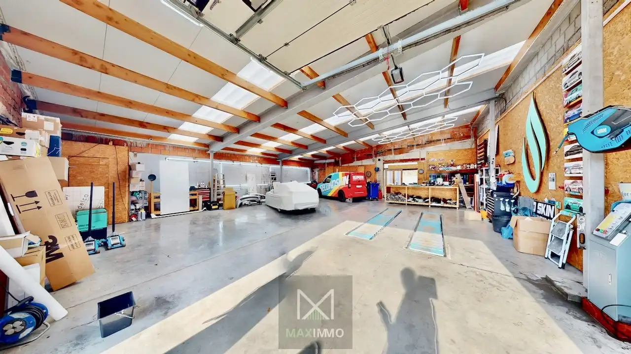 Gelijkvloerse bungalow met loods van 180 m² in het centrum van Marke foto 15