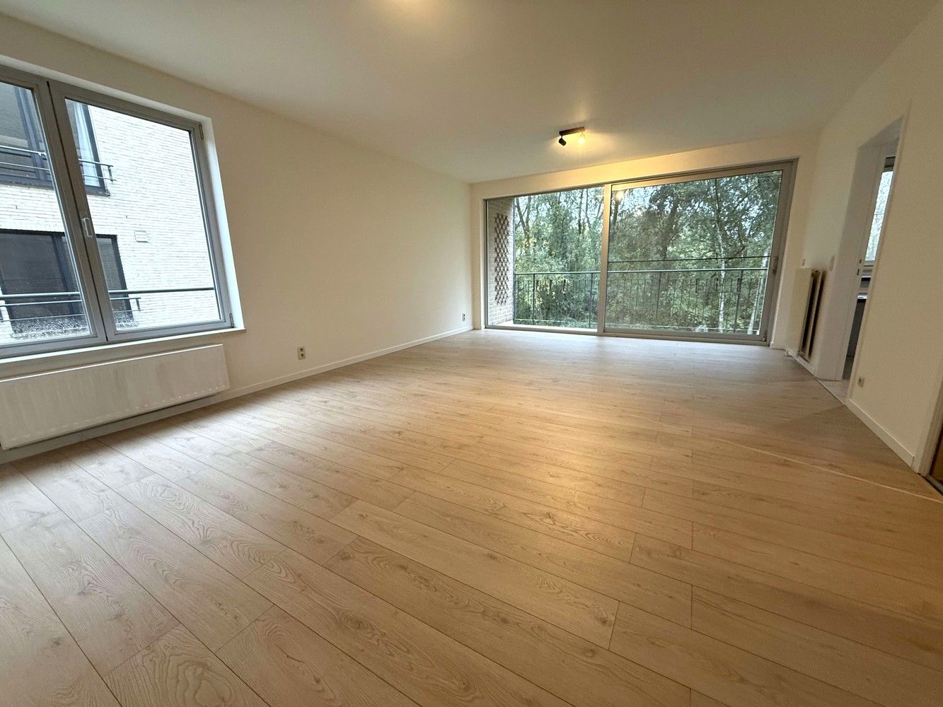Instapklaar appartement met 2 slaapkamers en binnenstaanplaats in groene omgeving vlakbij Leuven foto 2
