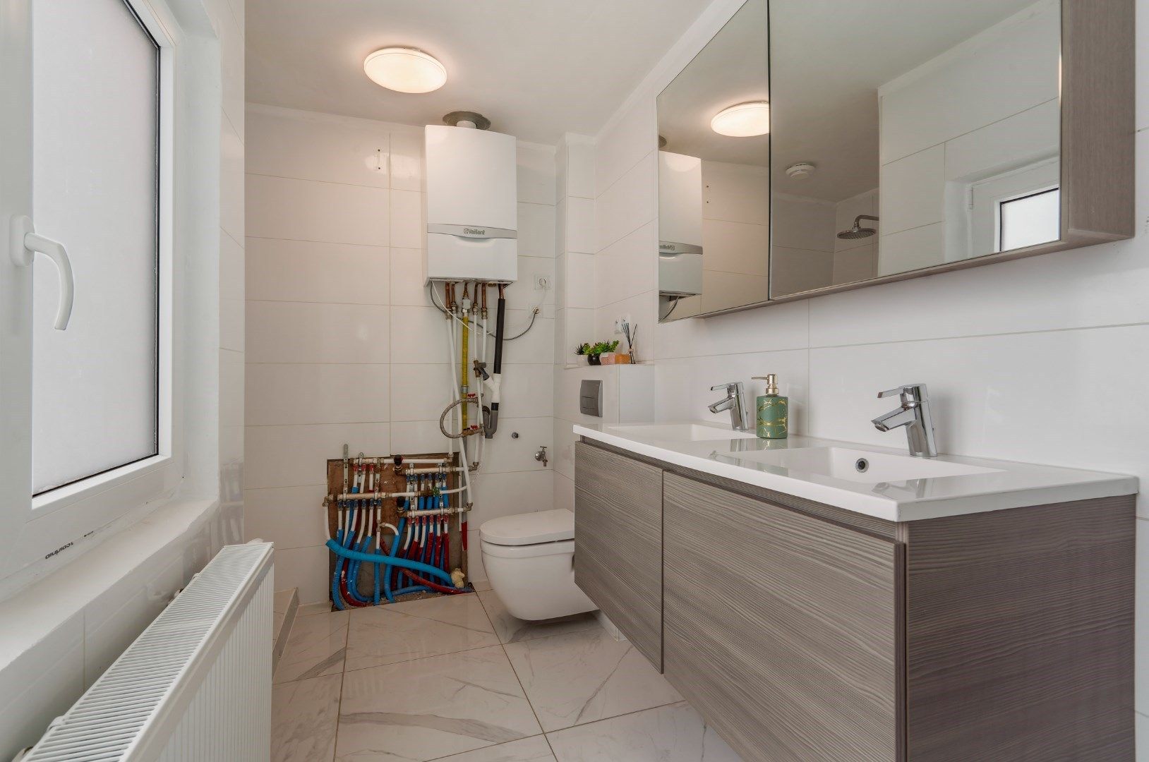 Verzorgde rijwoning gunstig gelegen te Oostende - Westerkwartier! foto 8