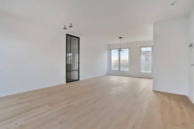 Instapklaar nieuwbouwappartement te huur in hartje Eeklo! foto 11