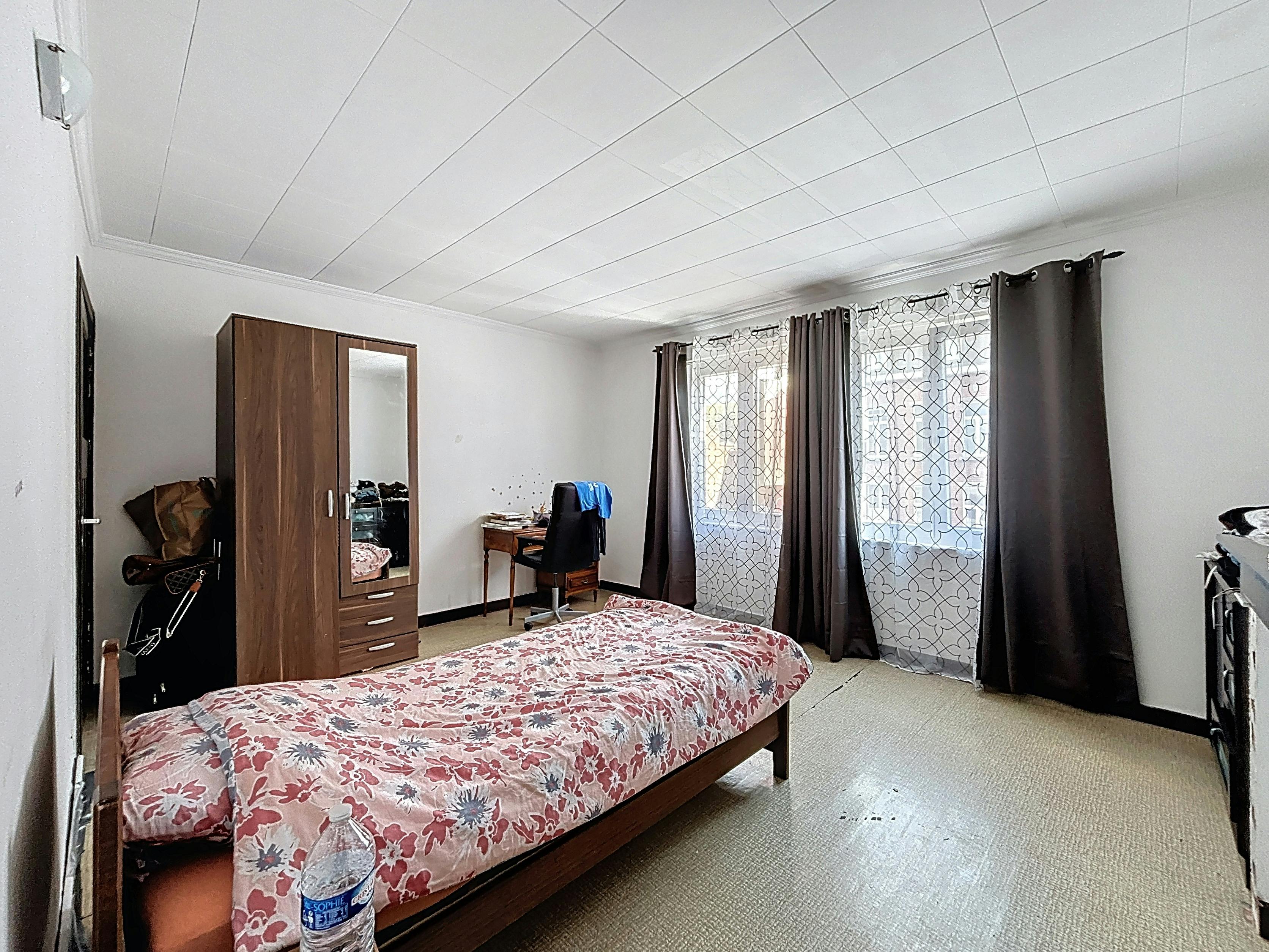 Te renoveren woning te koop in Kortrijk! foto 8