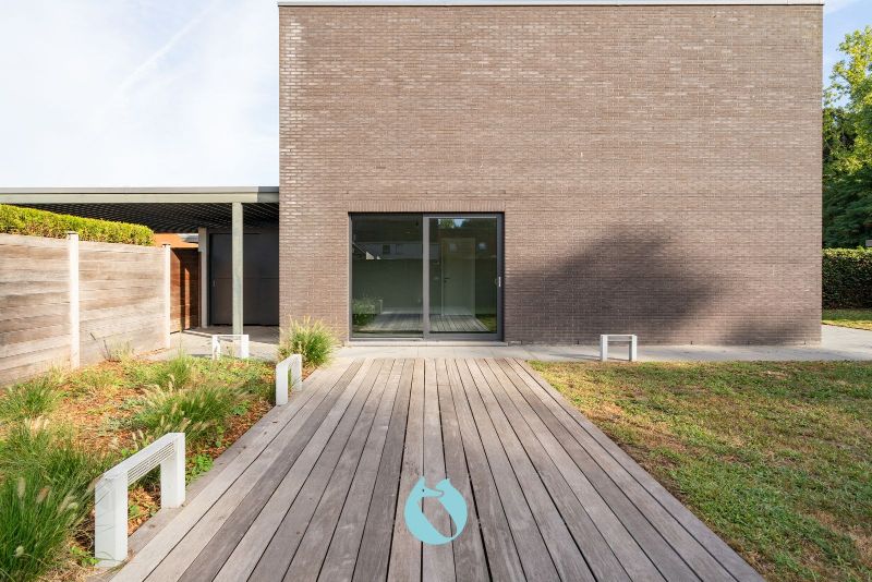 Deze woning is rustig gelegen in woonerf Brielken te Evergem foto 11
